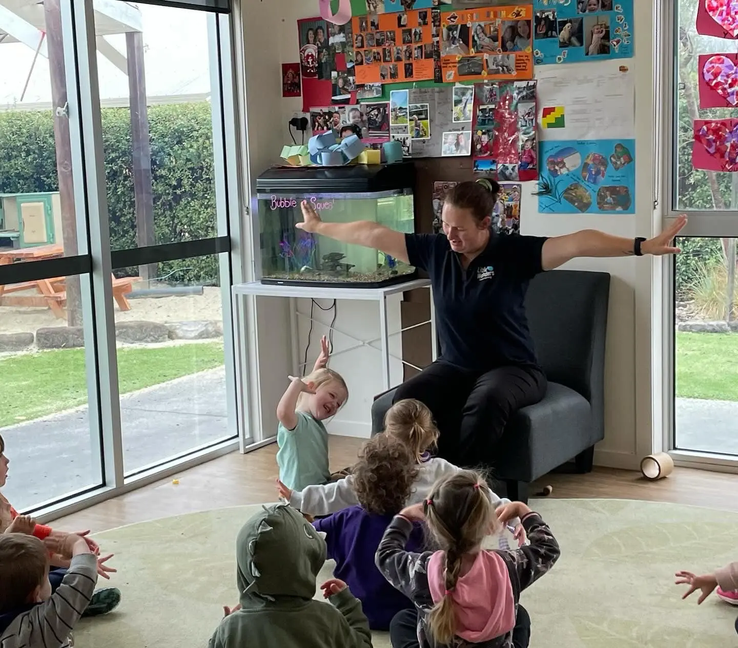Educator reading with children at Little Wonders Early Learning Sebastopol